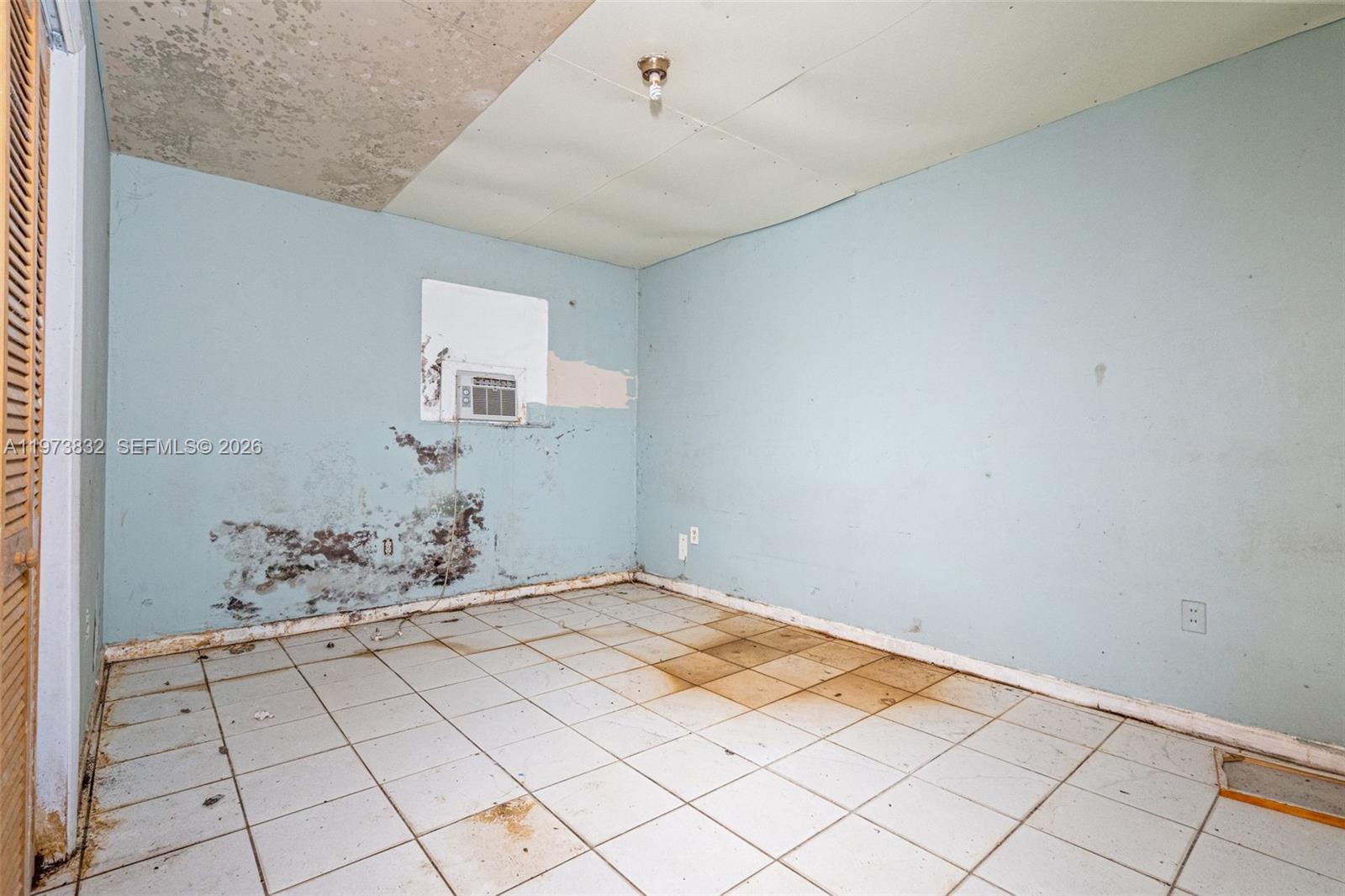 1045 Southwest 20th Avenue Miami, FL 33135 - Photo 35 of 53 a view of a room with white walls