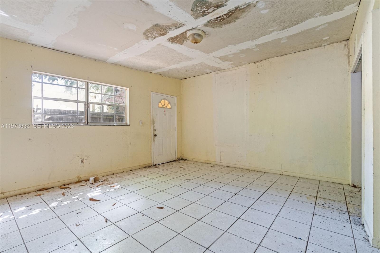 1045 Southwest 20th Avenue Miami, FL 33135 - Photo 38 of 53 an empty room with windows