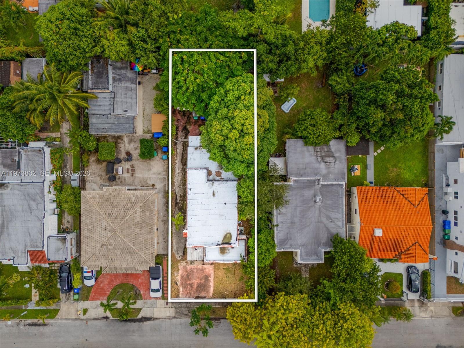 1045 Southwest 20th Avenue Miami, FL 33135 - Photo 47 of 53 an aerial view of a house with a garden and plants