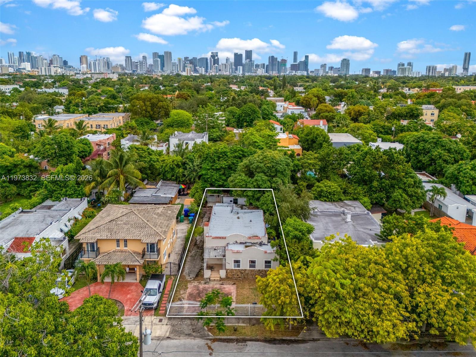 1045 Southwest 20th Avenue Miami, FL 33135 - Photo 48 of 53 an aerial view of residential houses with outdoor space and street view