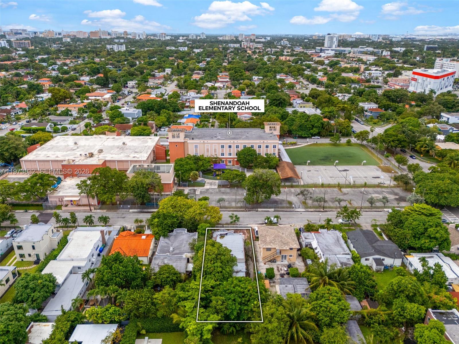 1045 Southwest 20th Avenue Miami, FL 33135 - Photo 50 of 53 an aerial view of residential houses with outdoor space