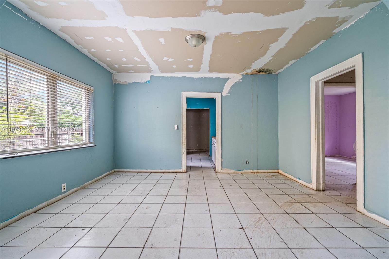 1045 Southwest 20th Avenue Miami, FL 33135 - Photo 9 of 53 a view of an empty room and window