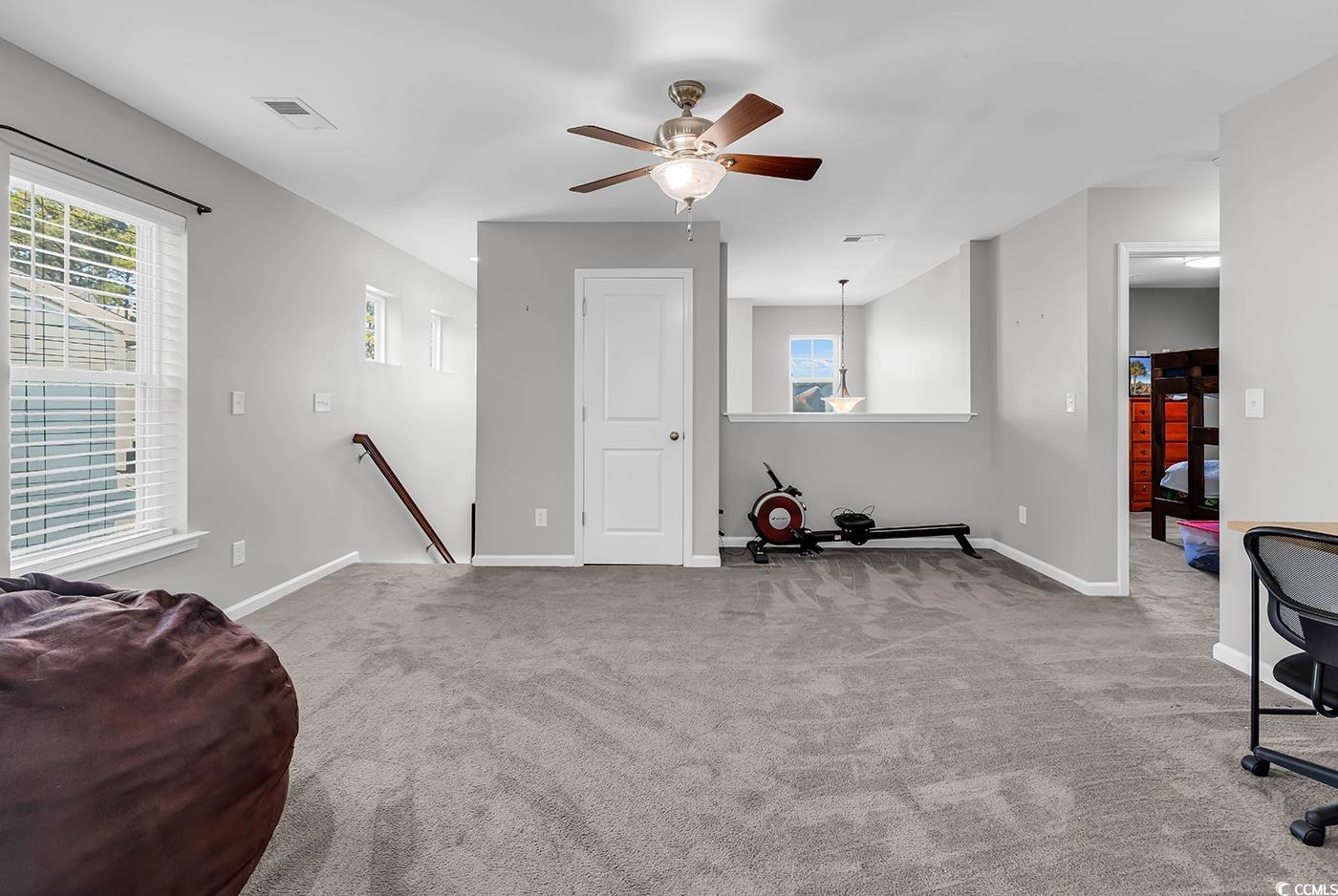 1005 Elysium Court Murrells Inlet, SC 29576 - Photo 25 of 37 Workout area featuring carpet floors and ceiling fan