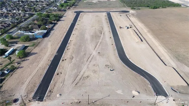 a view of a swimming pool with wooden floor