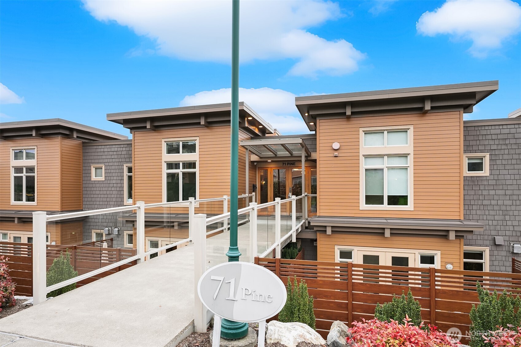 a front view of a house with table and chairs