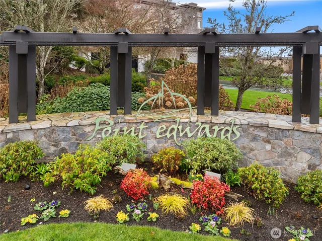 an aerial view of a house with a ocean view