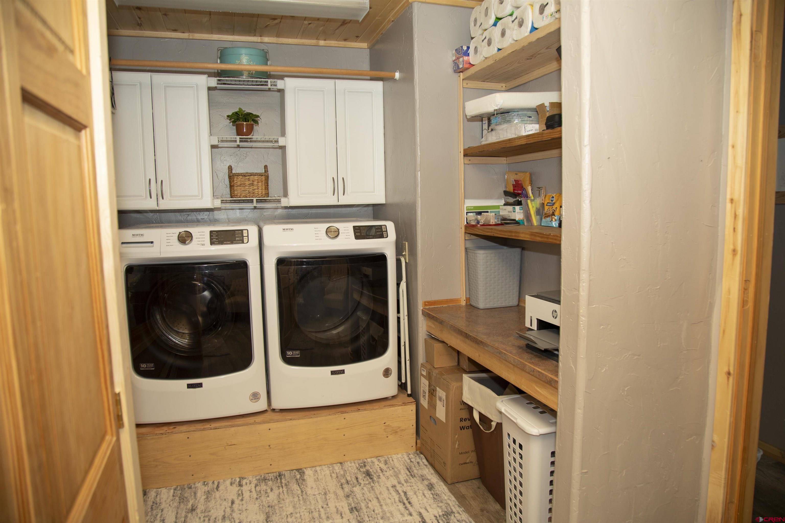 258 Diamond Road Creede, CO 81130 - Photo 18 of 30 a utility room with dryer and washer