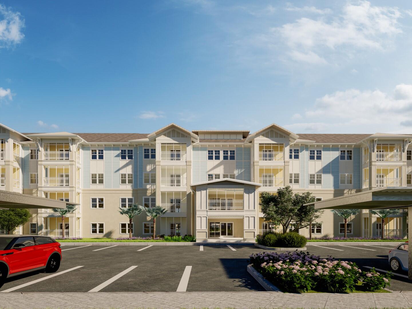 1916 Northwest Federal Highway, Unit 3106 Stuart, FL 34994 - Photo 13 of 26 a view of building with cars parked across