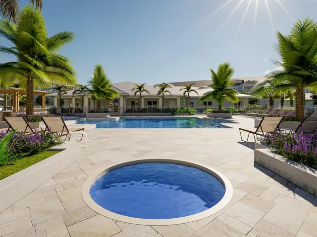 a swimming pool with outdoor seating and yard