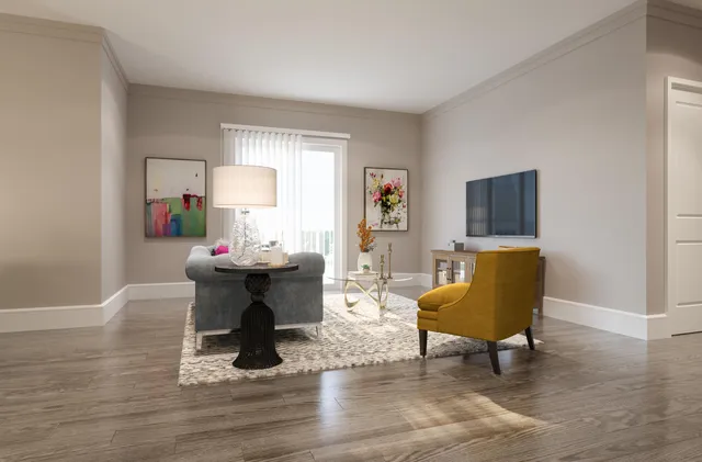 a living room with furniture a window and a table