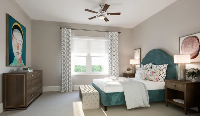 a bedroom with a bed dresser and a window