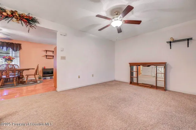 a bed room with a bed and a chandelier