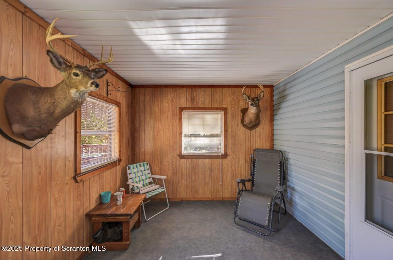 145 Tunnel Road Nicholson, PA 18446 - Photo 42 of 70 a living room with furniture and a window