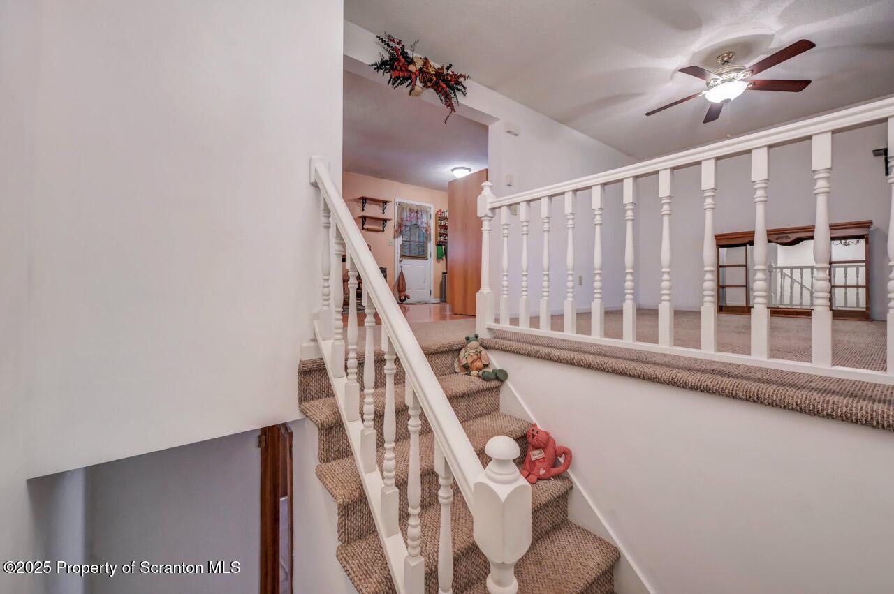 145 Tunnel Road Nicholson, PA 18446 - Photo 47 of 70 a view of entryway with stairs and wooden floor