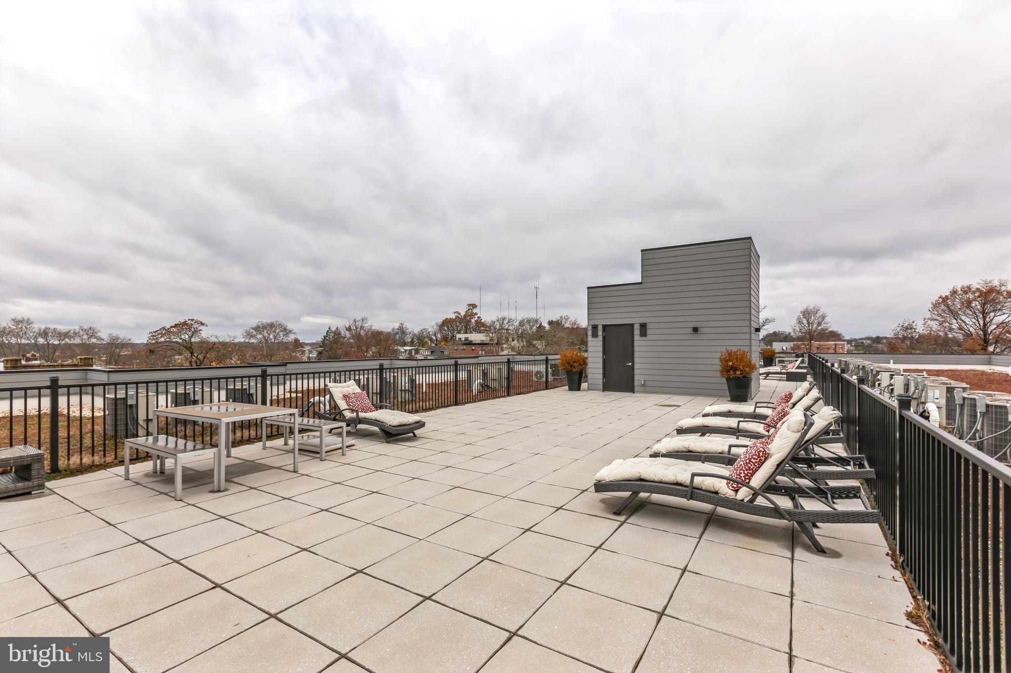 5801 Ridge Avenue, Unit 201 Philadelphia, PA 19128 - Photo 14 of 26 a terrace of a house with outdoor seating