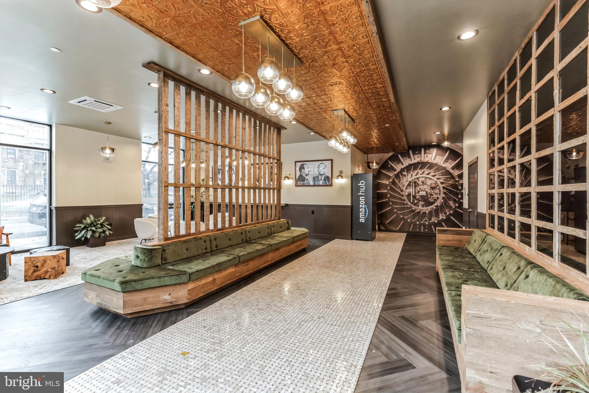 5801 Ridge Avenue, Unit 201 Philadelphia, PA 19128 - Photo 22 of 26 a lobby with furniture and a rug
