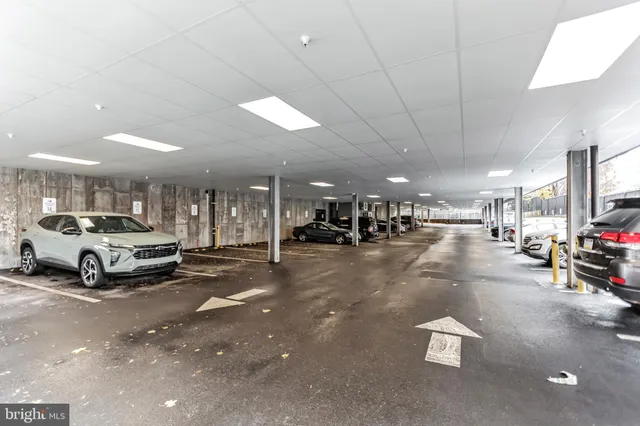 a view of a street with a building in the background