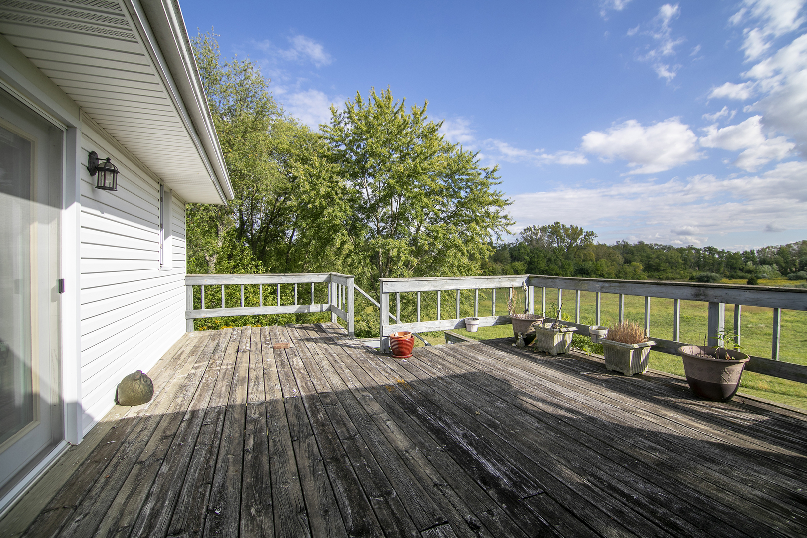 52 Highway 45 Sigel, IL 62462 - Photo 20 of 57 a view of balcony with wooden floor and fence