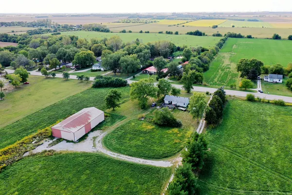 a view of a garden with a building