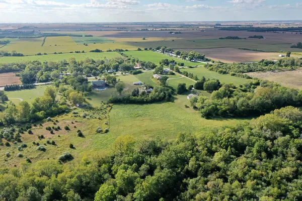 a view of a lake with a big yard