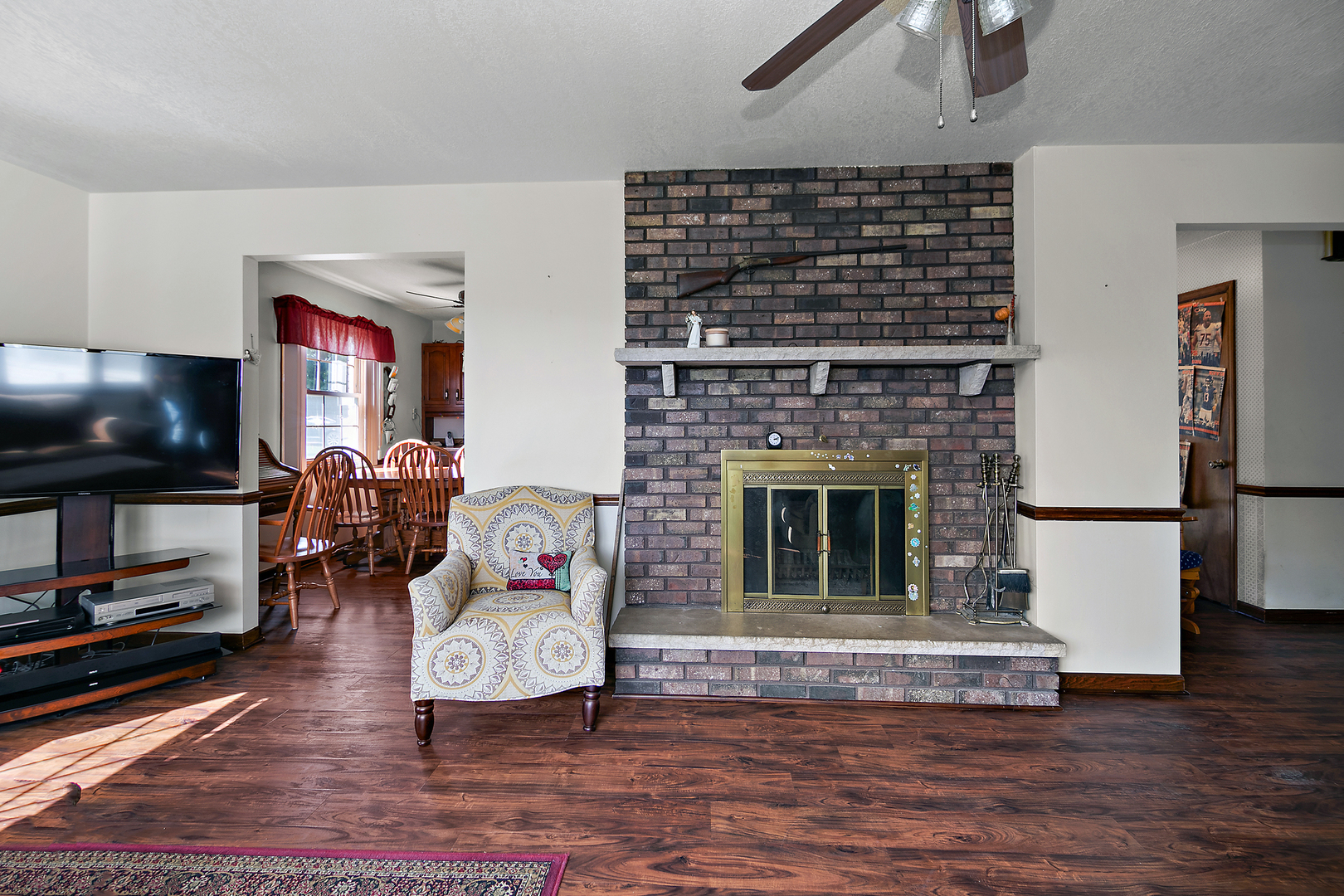 52 Highway 45 Sigel, IL 62462 - Photo 3 of 57 a living room with furniture and a fireplace