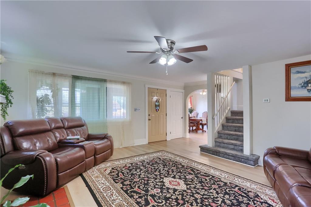 5216 Verona Road Verona, PA 15147 - Photo 15 of 42 a living room with furniture and wooden floor