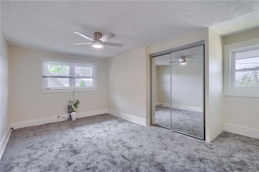 5216 Verona Road Verona, PA 15147 - Photo 41 of 42 an empty room with windows and closet