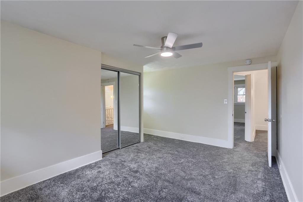 5216 Verona Road Verona, PA 15147 - Photo 42 of 42 an empty room with closet and a ceiling fan