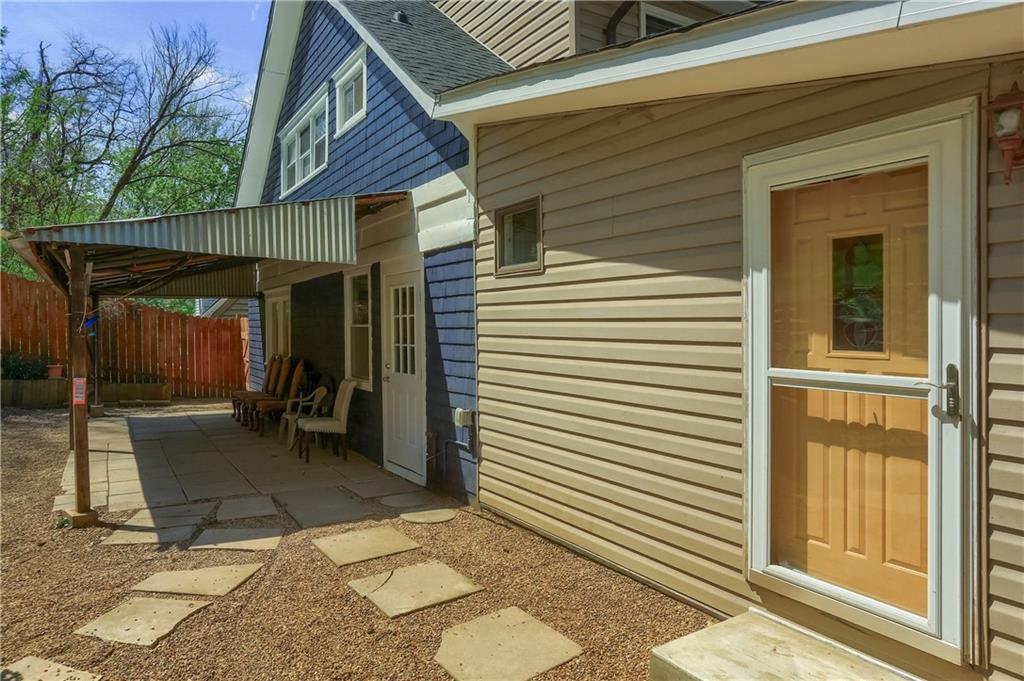 5216 Verona Road Verona, PA 15147 - Photo 7 of 42 a view of a patio with table and chairs and a barbeque