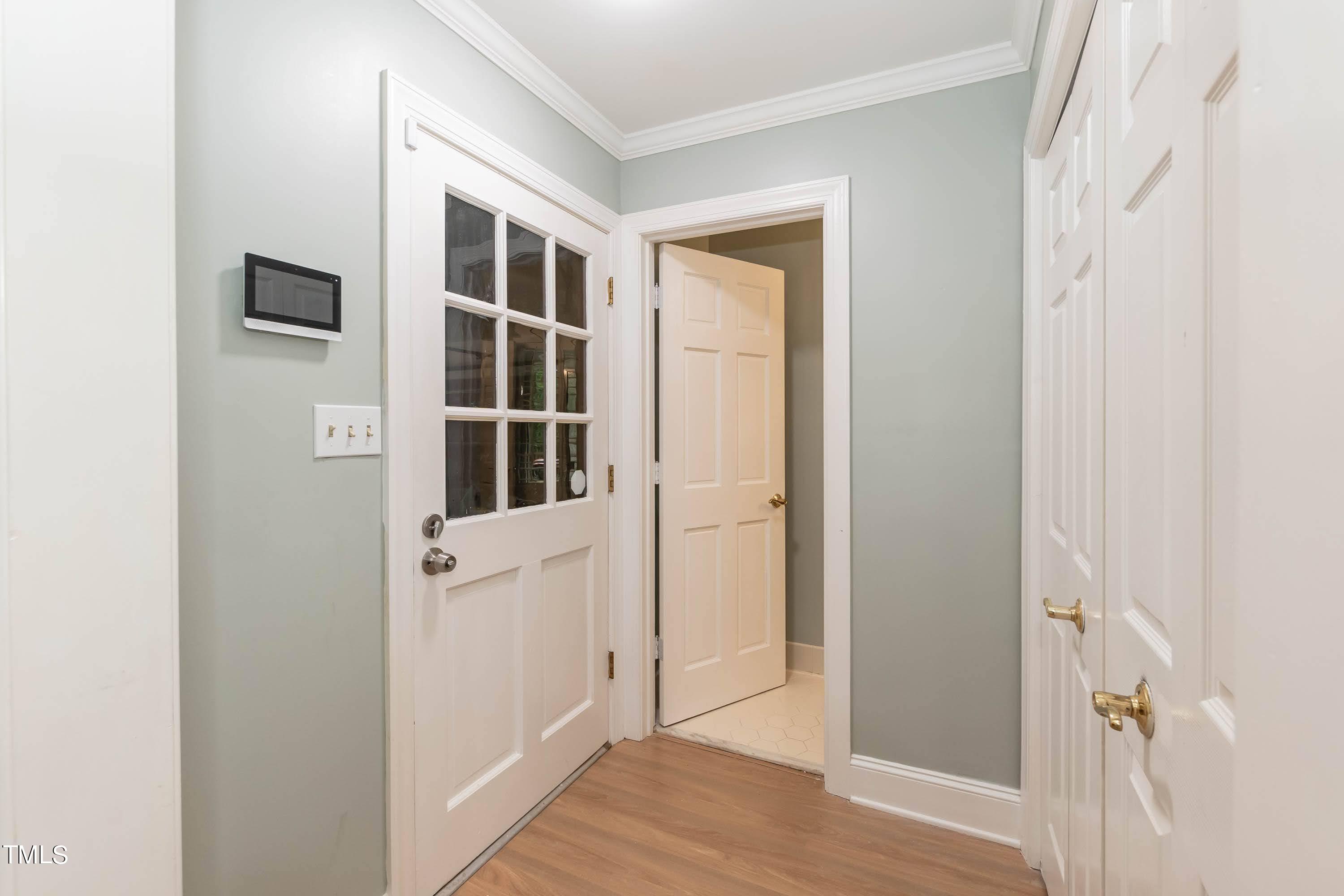 9209 Oneal Road Raleigh, NC 27613 - Photo 25 of 53 a view of small space with wooden floor and entrance
