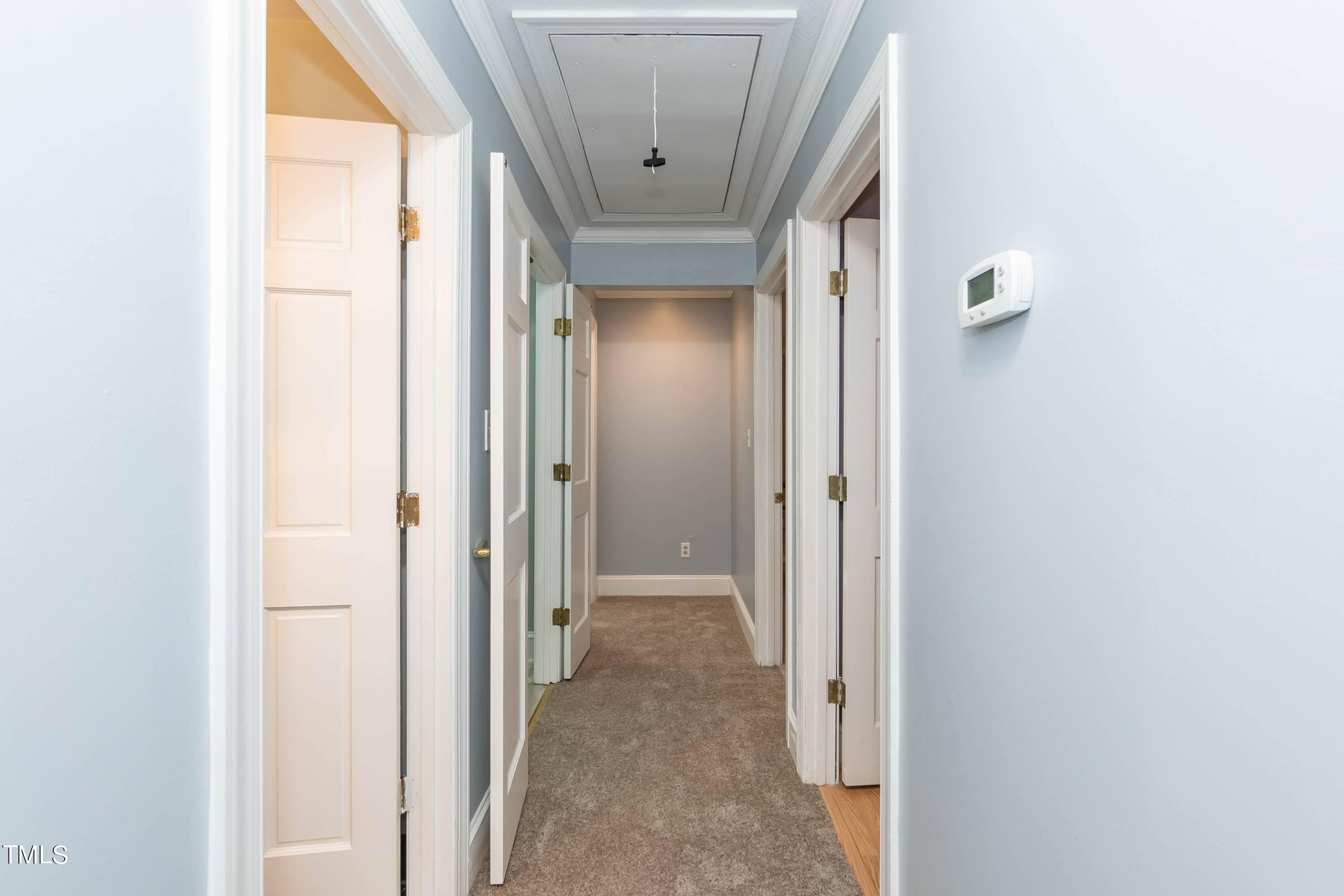 9209 Oneal Road Raleigh, NC 27613 - Photo 26 of 53 a view of a livingroom from a hallway