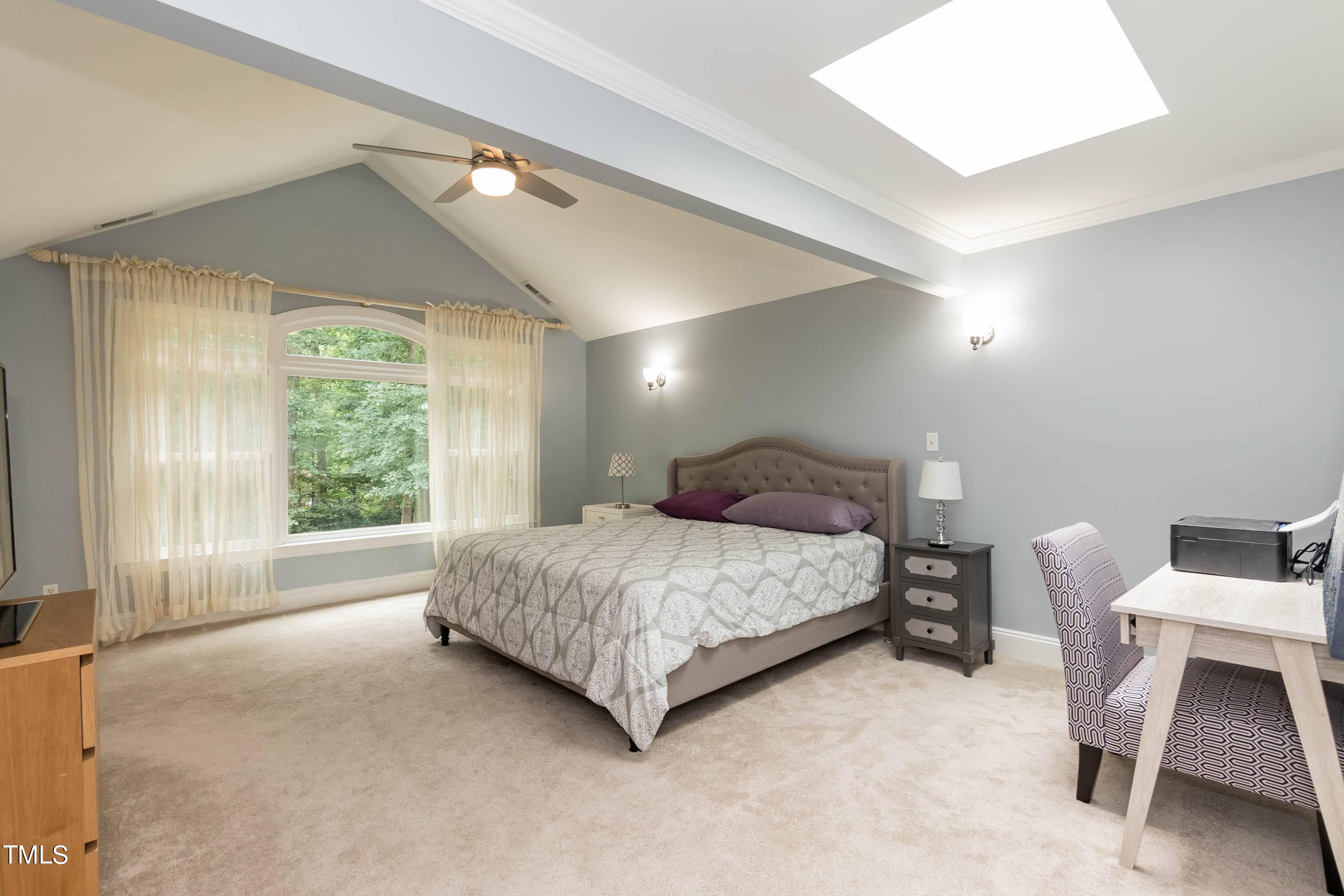 9209 Oneal Road Raleigh, NC 27613 - Photo 27 of 53 a bedroom with a bed chair and window
