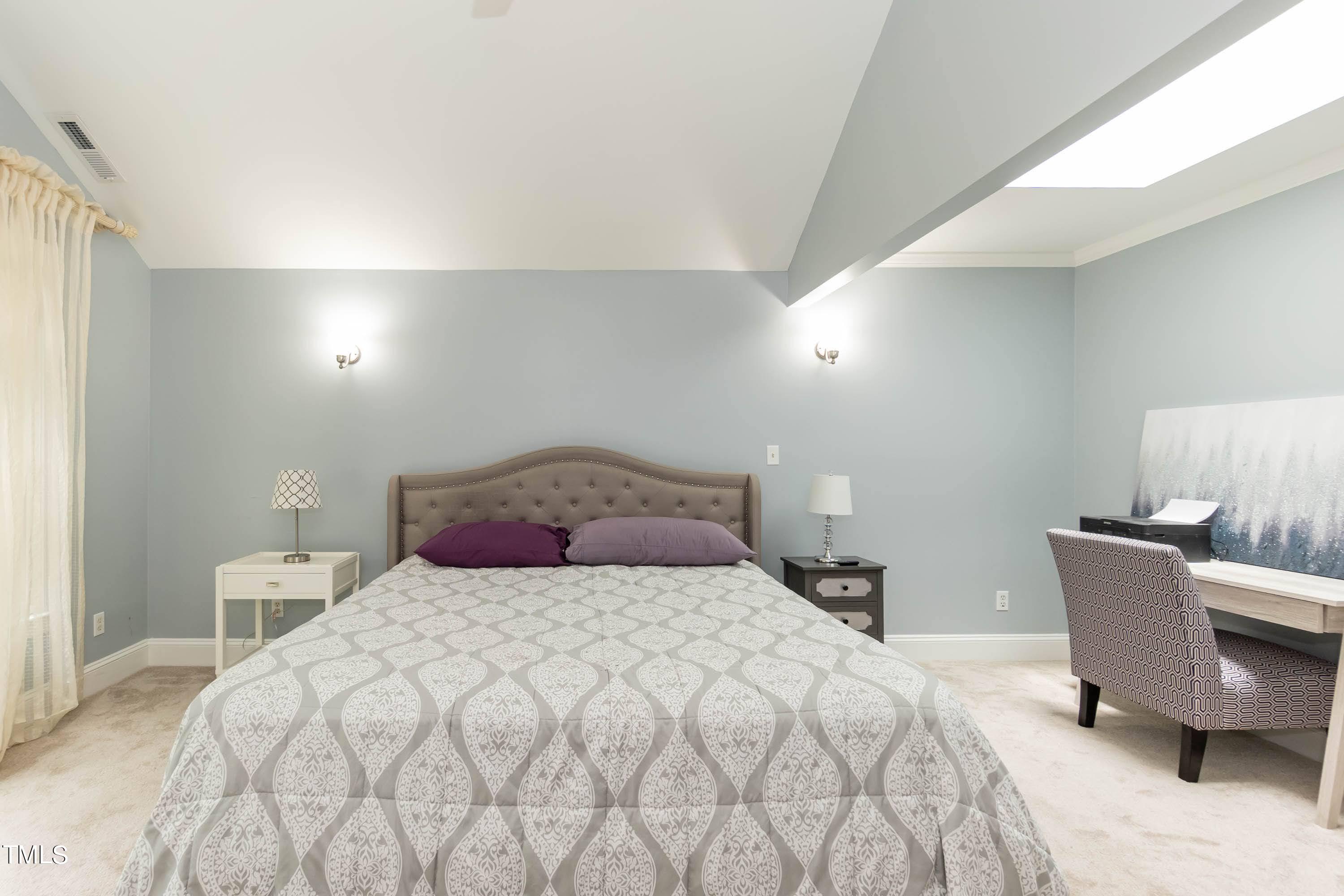 9209 Oneal Road Raleigh, NC 27613 - Photo 28 of 53 a bedroom with a bed and chair