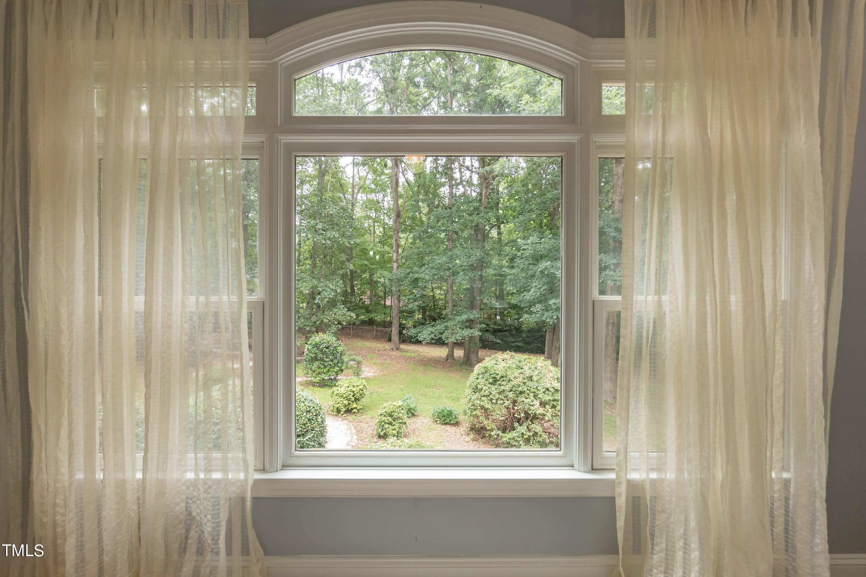 9209 Oneal Road Raleigh, NC 27613 - Photo 30 of 53 a window with lake view