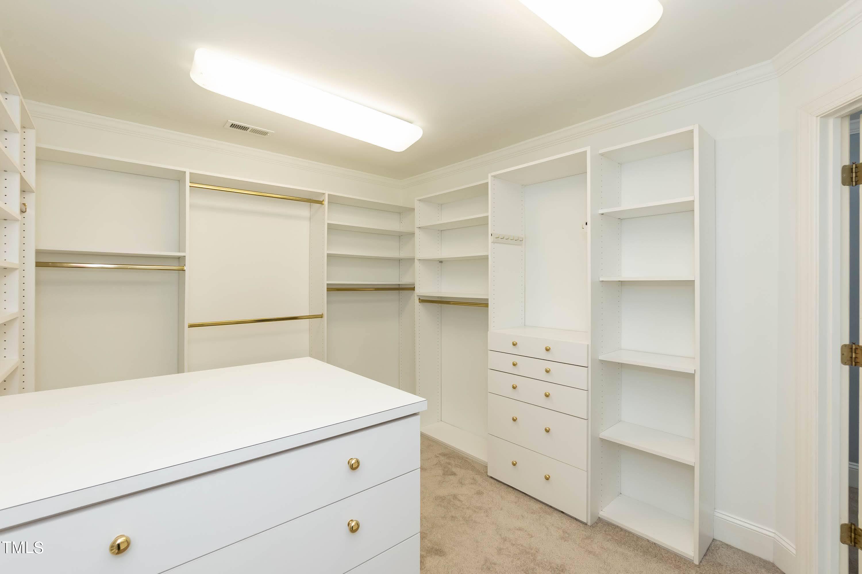 9209 Oneal Road Raleigh, NC 27613 - Photo 33 of 53 a view of an empty walk in closet