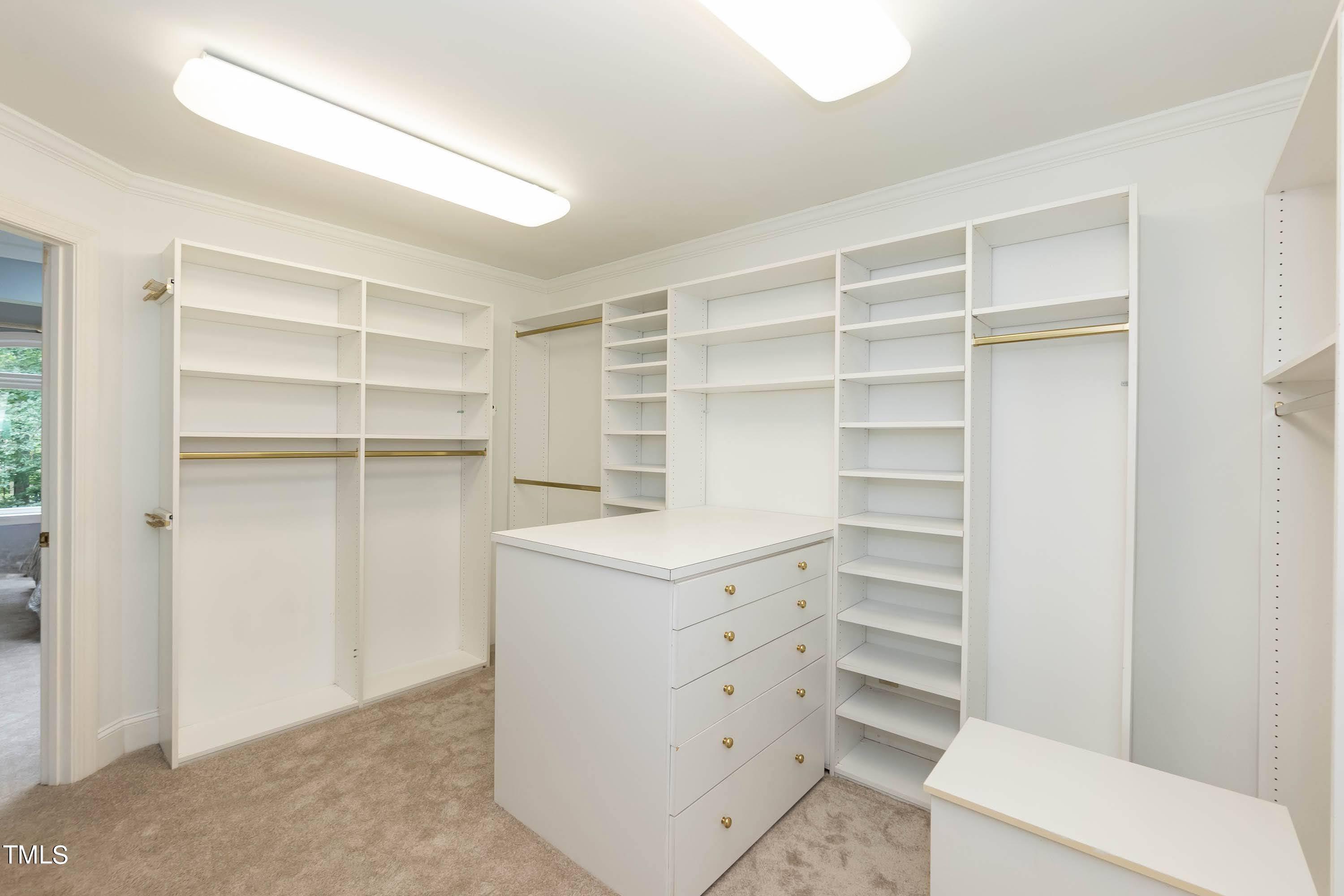 9209 Oneal Road Raleigh, NC 27613 - Photo 34 of 53 a view of a walk in closet