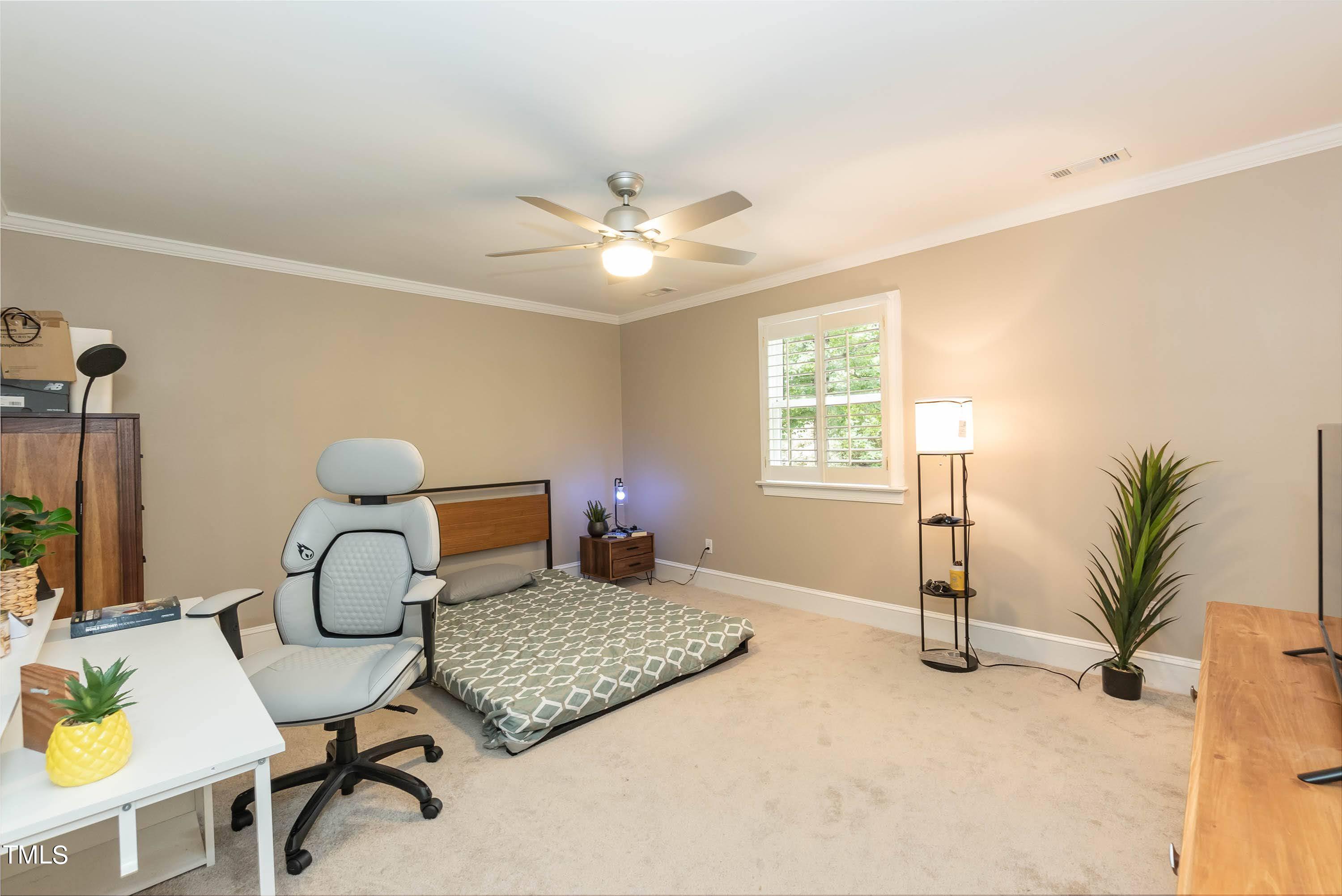 9209 Oneal Road Raleigh, NC 27613 - Photo 37 of 53 a bedroom with furniture and a window