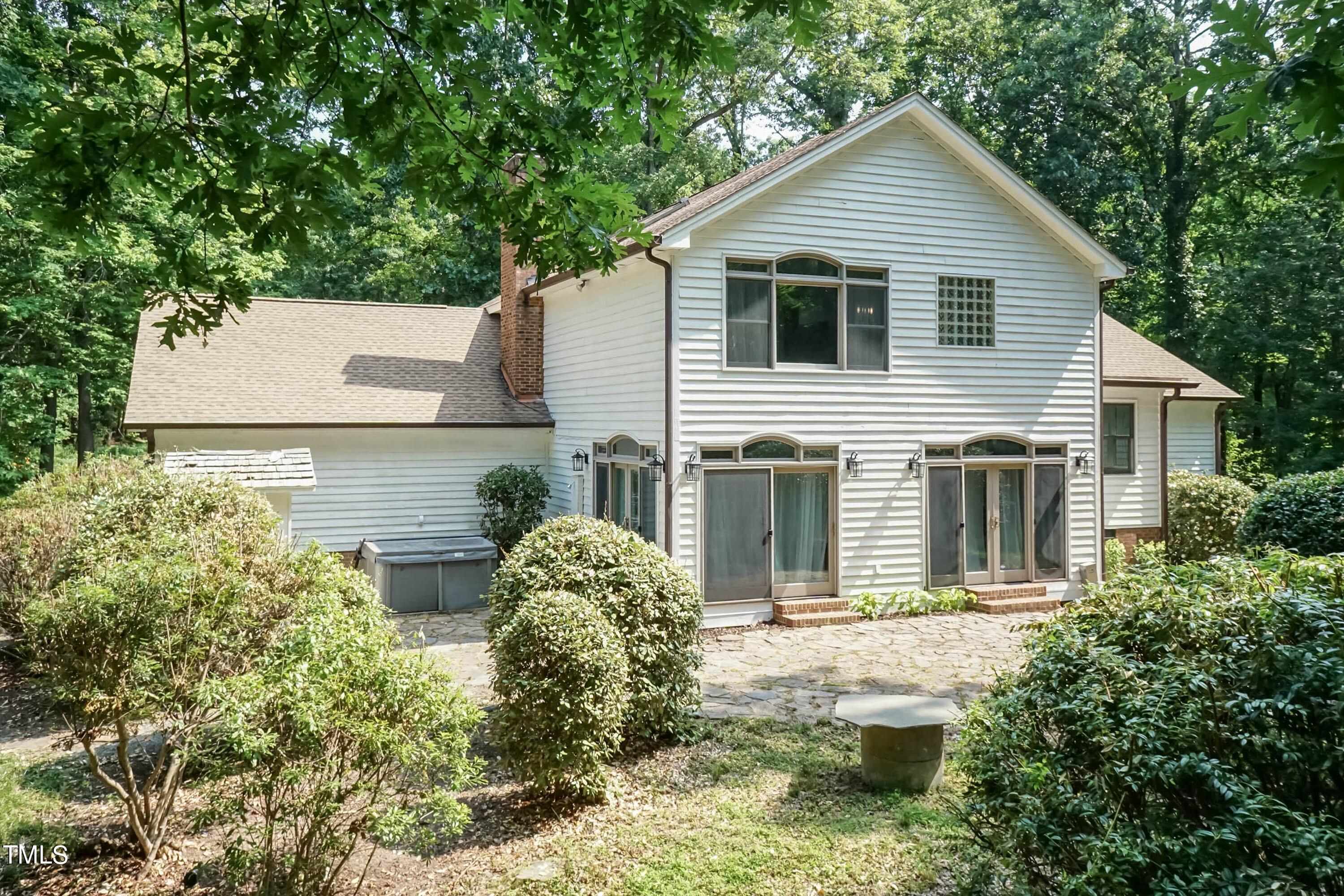 9209 Oneal Road Raleigh, NC 27613 - Photo 45 of 53 a front view of house with yard and trees in the background