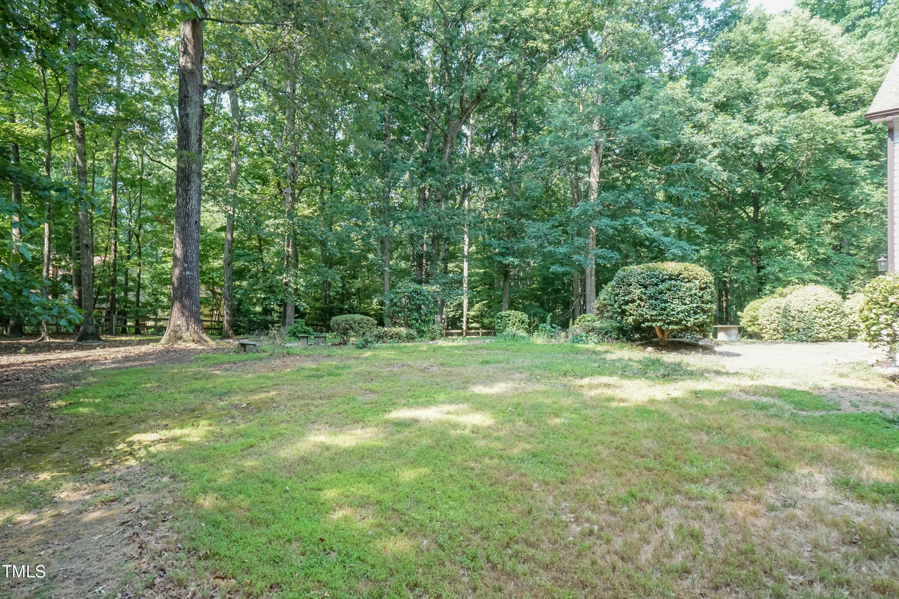 9209 Oneal Road Raleigh, NC 27613 - Photo 50 of 53 a view of a field with a tree