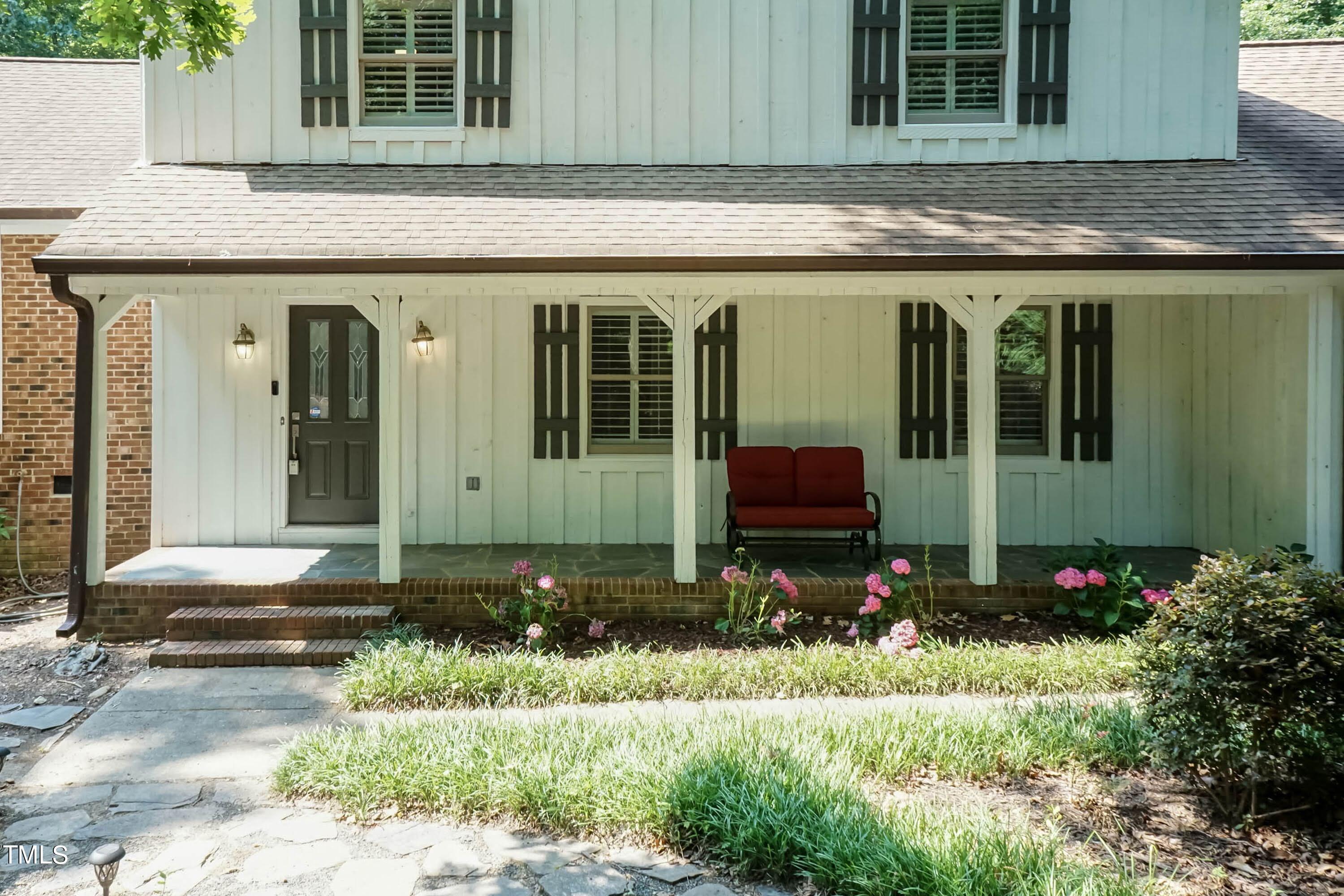 9209 Oneal Road Raleigh, NC 27613 - Photo 5 of 53 a front view of a house with a yard