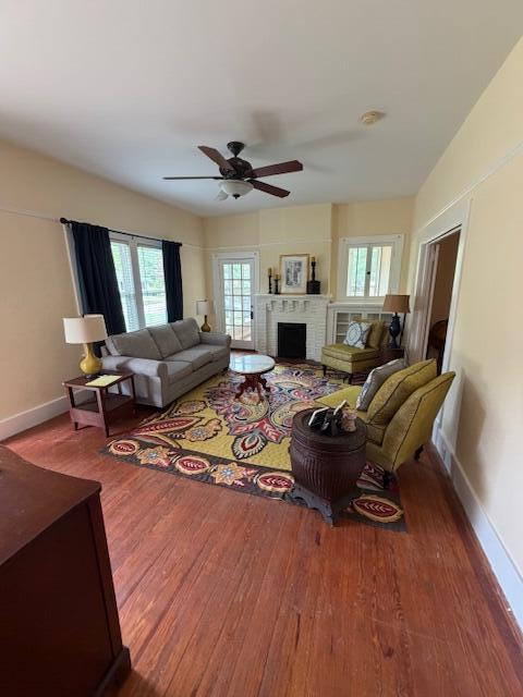 82 Nightingale Street Barnwell, SC 29812 - Photo 10 of 13 a living room with furniture a fireplace and a window