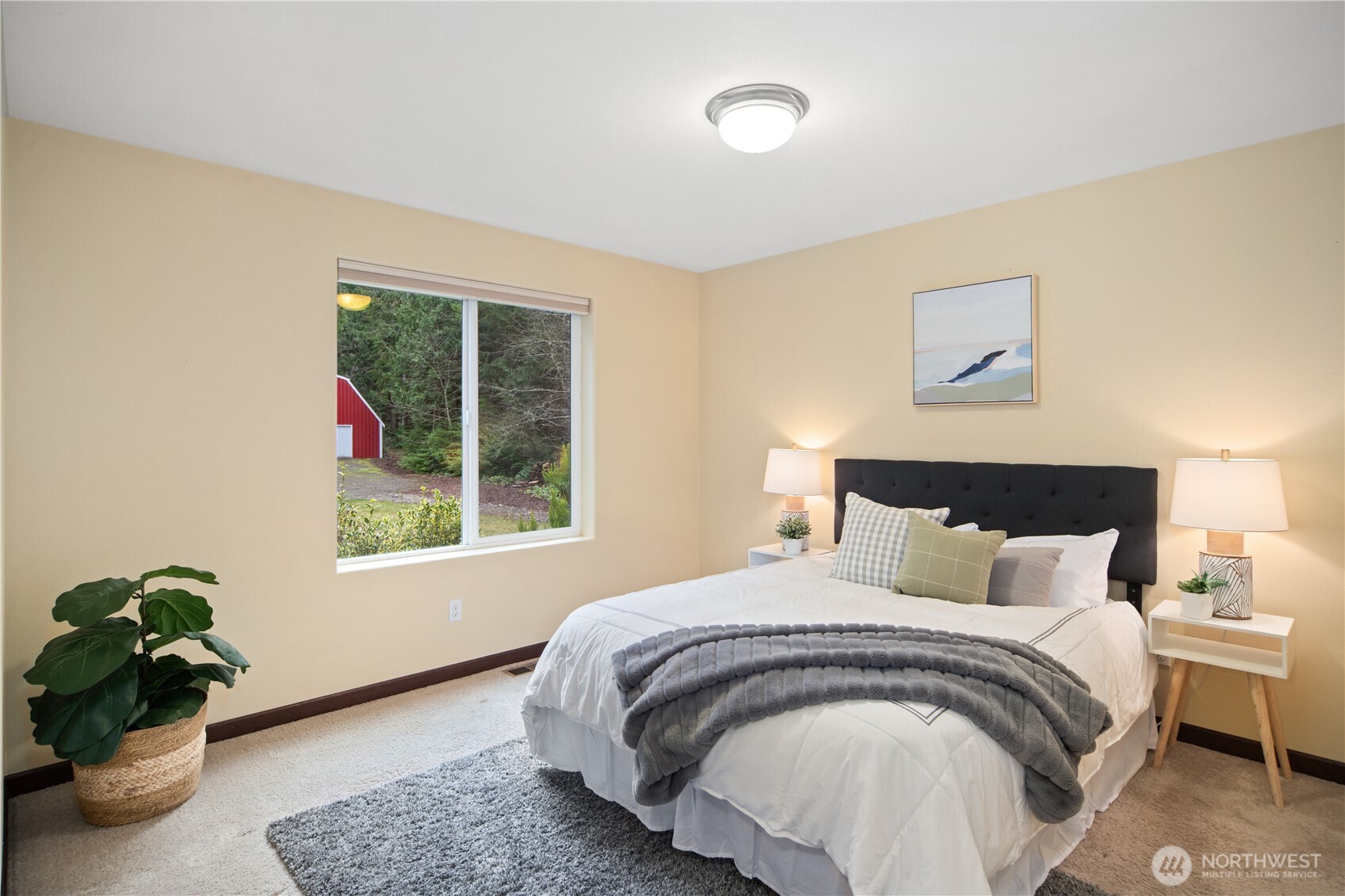 1914 South Discovery Road Port Townsend, WA 98368 - Photo 24 of 39 a bedroom with a bed and a window