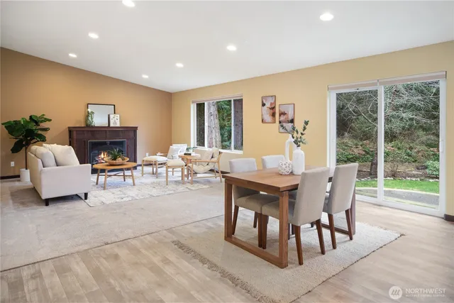 a view of a dining room with furniture window and outside view