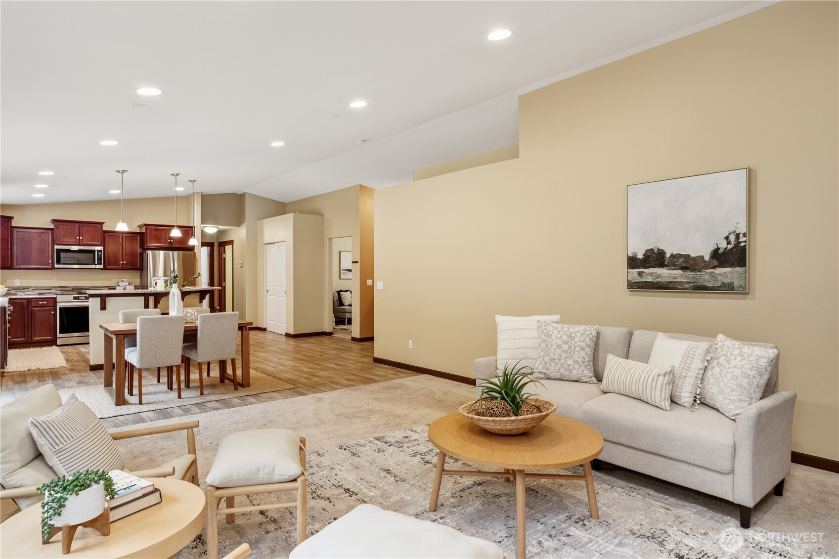 1914 South Discovery Road Port Townsend, WA 98368 - Photo 8 of 39 a living room with furniture and a dining table with kitchen view