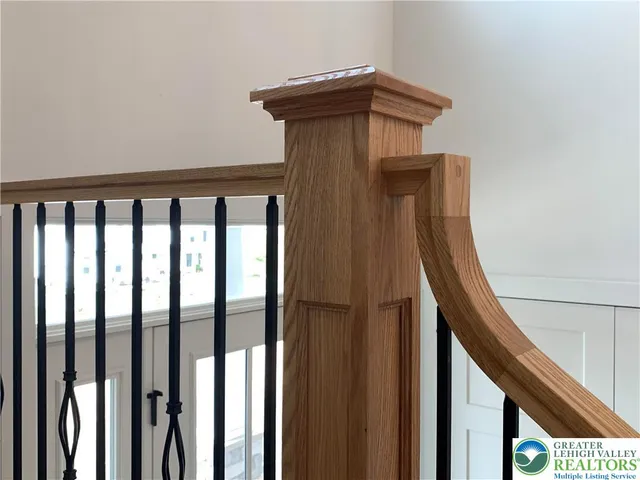 a bathroom with a sink a toilet a mirror and vanity