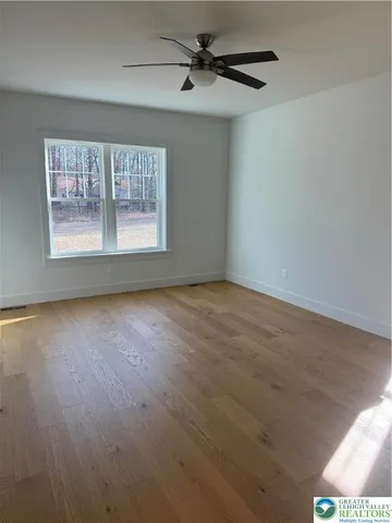 a view of a yard with an ocean view