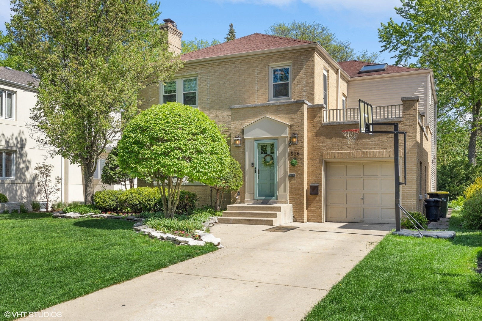 526 Uvedale Road Riverside, IL 60546 - Photo 1 of 34 front view of a house with a yard