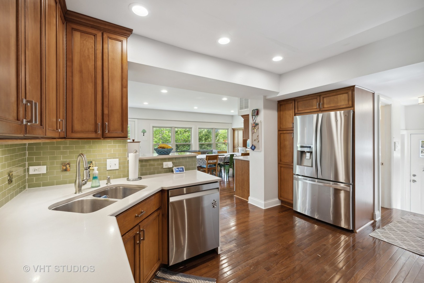526 Uvedale Road Riverside, IL 60546 - Photo 12 of 34 a kitchen with stainless steel appliances granite countertop a sink stove and refrigerator