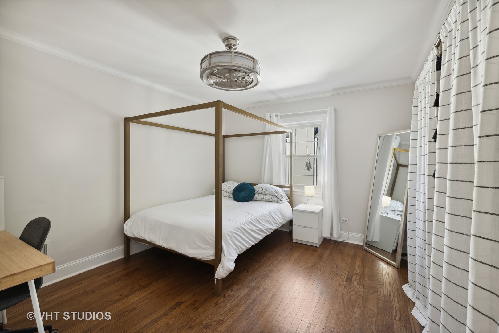 526 Uvedale Road Riverside, IL 60546 - Photo 20 of 34 a bedroom with a bed and a chandelier