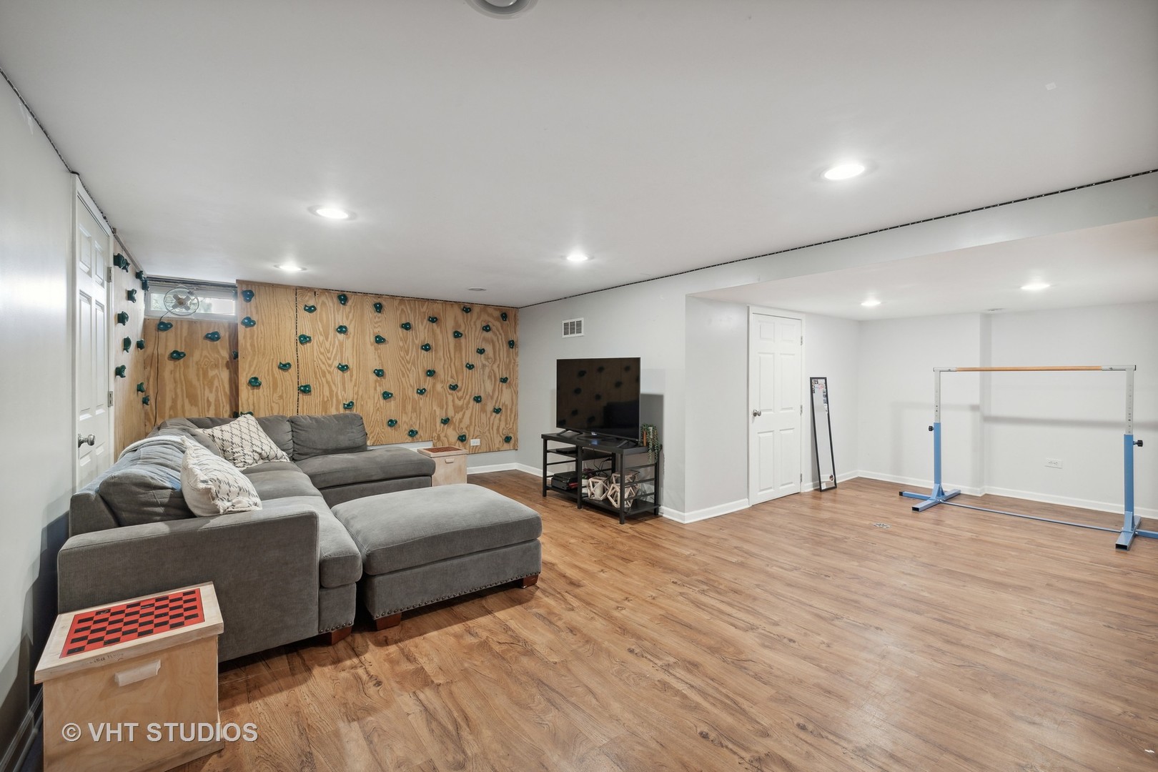 526 Uvedale Road Riverside, IL 60546 - Photo 26 of 34 a living room with furniture and a flat screen tv